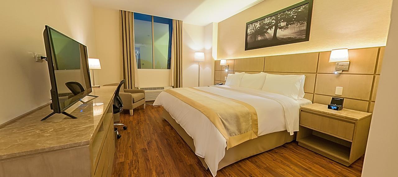 Radisson Hotel Guayaquil Extérieur photo A bedroom